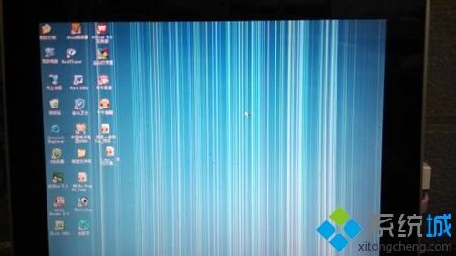 xp电脑屏幕出现条纹并闪烁如何解决